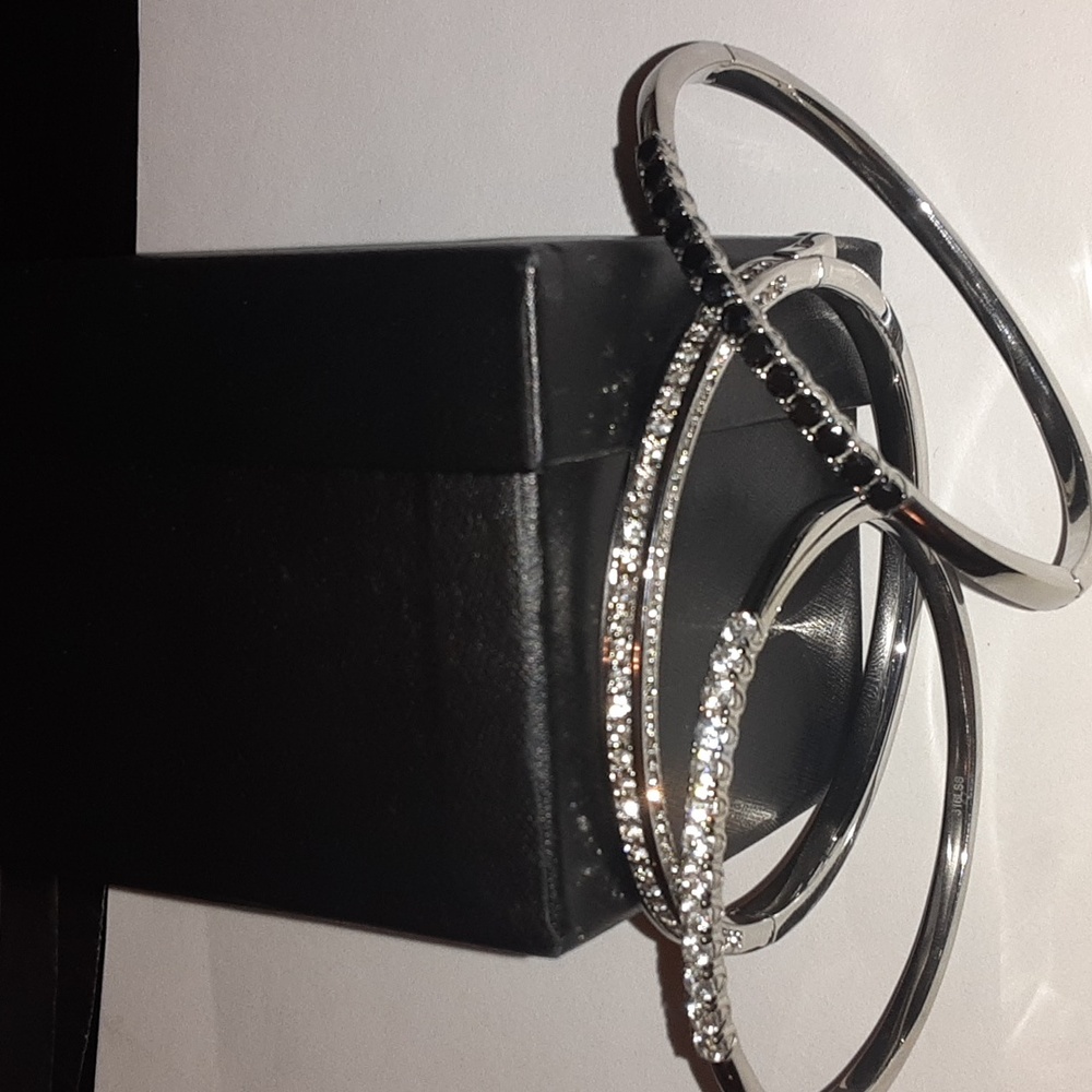 Three bangle bracelets.  Black Spinel, zircon, and crystal.